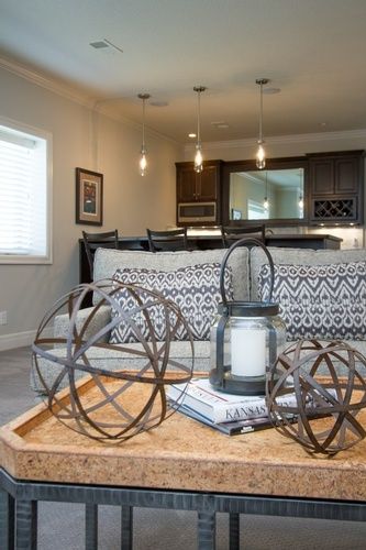 Candle Lantern Kept on Coffee Table Near Sofa in Living Room -  Interior Design Services by R Designs, LLC